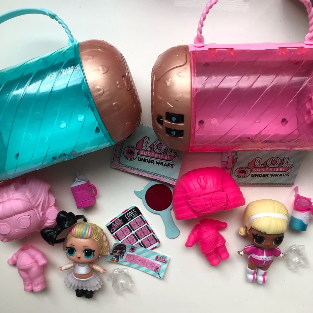 L.O.L. Surprise! Doll Under Wrap Playset with Pink & Teal Capsules